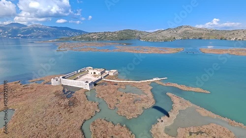 Stunning aerial view of Albania coastline, featuring crystal-clear blue waters, untouched sandy beaches, and natural coastal beauty