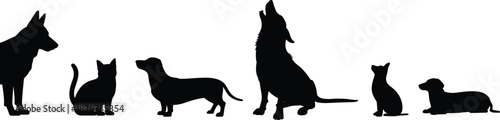 Collection of Animal Silhouettes Including Various Dog Breeds, a Howling Wolf, and Cats, Representing Domestic and Wild Pet Life in Vector Format