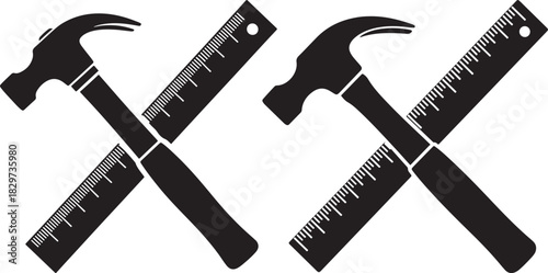 Two crossed hammers and rulers in a bold black silhouette