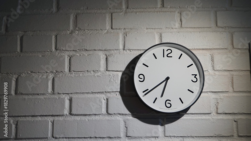 Wallpaper Mural Minimalist wall clock hanging on a white brick wall with soft shadow and evening light. Perfect for time-themed designs, interior backgrounds, productivity concepts, and modern decor visuals. Torontodigital.ca