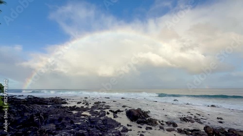 Morning rainbow over the ocean along the Kaanapali coastline on the west side of Maui in Hawaii. 