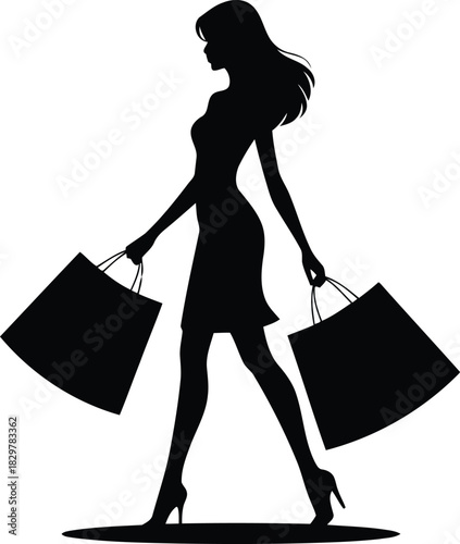 Elegant womans silhouette walking and carrying two large shopping bags after a successful retail trip
