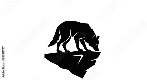 Black silhouette of a lone wolf standing on a rocky cliff edge.