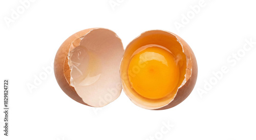 Broken open egg with yolk and shell separated on transparent background studio isolated on transparent background