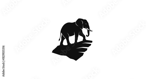 Silhouette of an Elephant Standing on a Rock Formation.