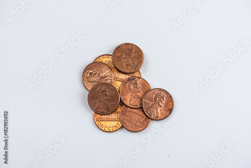 Pile of Copper Pennies on White Background Close-Up Coin Collection for Money and Change