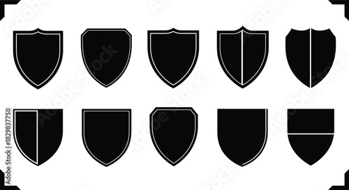 Set of black silhouette shield icons representing security, protection, defense, and heraldry emblems.