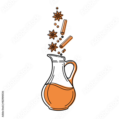 Festive jug with mulled wine and spices with cinnamon and star anise  