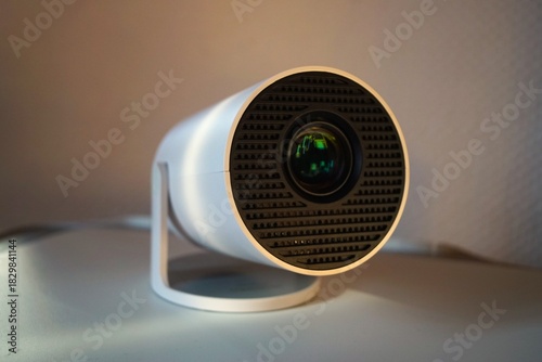 small white projector for showing videos