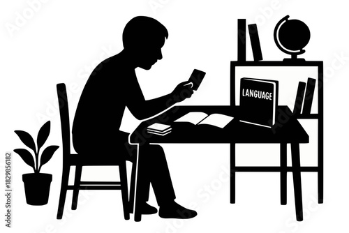 Silhouetted figure studies with flashcards, open book and desk lamp in a quiet, organized workspace.