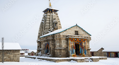 Kedarnath temple, shrine covered with snow. Kedarnath temple is a Hindu temple dedicated to Shiva. Located on the Garhwal Himalayan range near the Mandakini rive