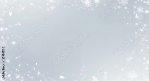 Elegant light blue winter background with sparkling white snowflakes and festive Christmas tree shapes forming a decorative border, perfect for holiday designs.