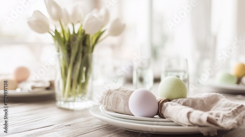 White flowers and Easter eggs on a table setting