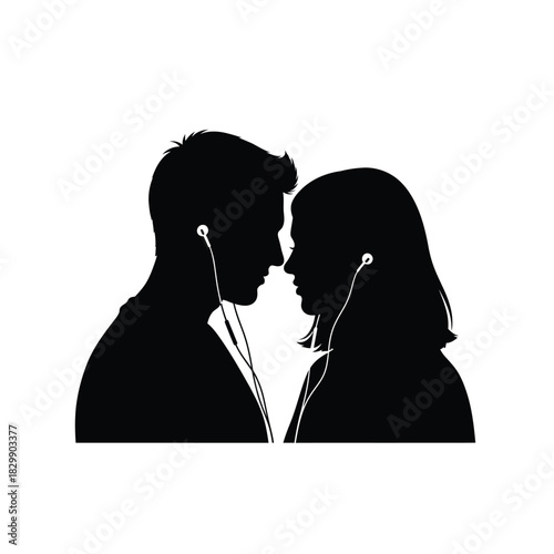 Couple sharing earbuds silhouette