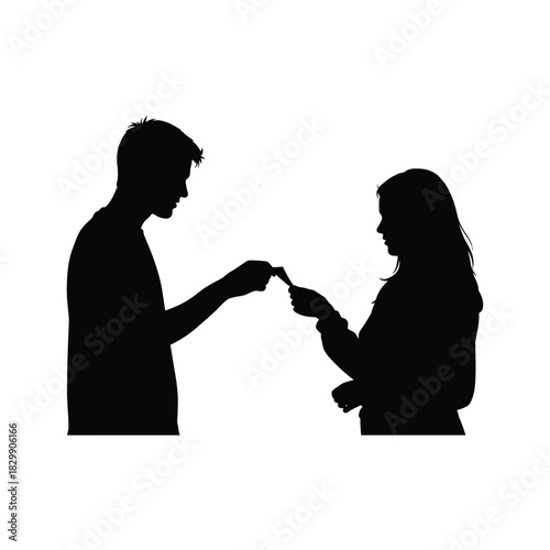 Man and woman exchanging an object silhouette