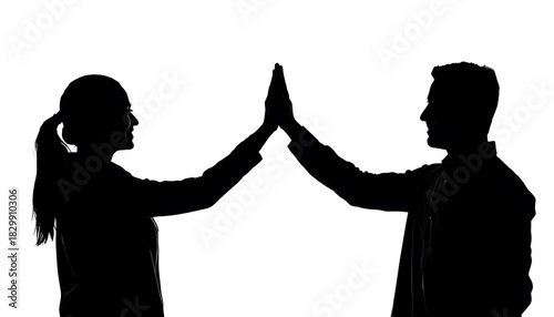 Silhouette of Man and Woman Giving High Five: Concept of Teamwork, Partnership, and Business Success on White Background