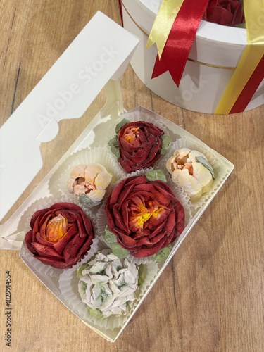 Homemade marshmallow. Marshmallow flowers in a gift box. Top view.