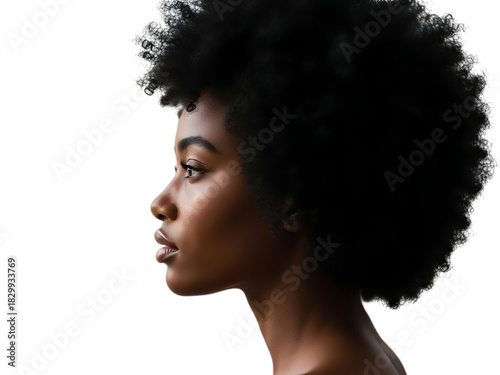 Profile portrait of a beautiful young black woman with a large natural afro hairstyle looking thoughtfully to the side, isolated on transparent background