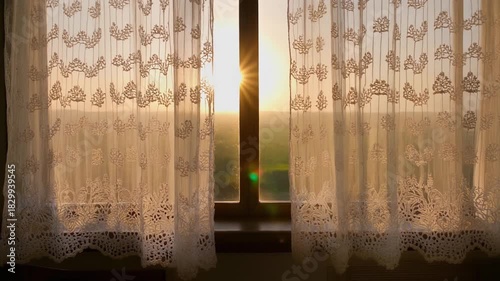 夕焼けの景色、春の陽射しにレースのカーテンがゆっくりなびくシームレスループ