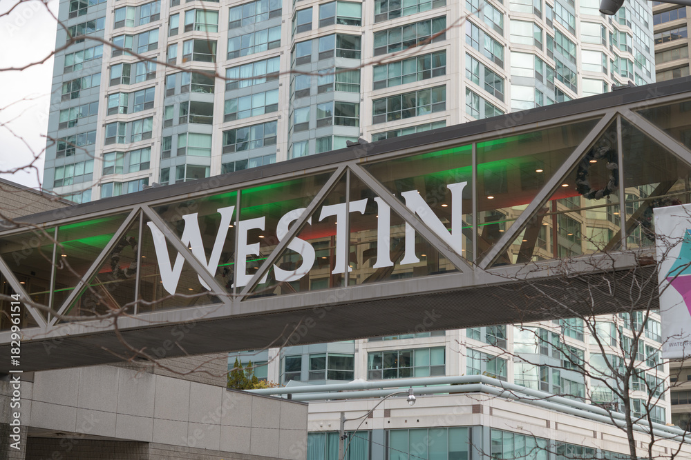 Obraz premium covered pedestrian walk with sign at The Westin Harbour Castle, a four-star hotel, located at 1 Harbour Square on Queens Quay W, Toronto