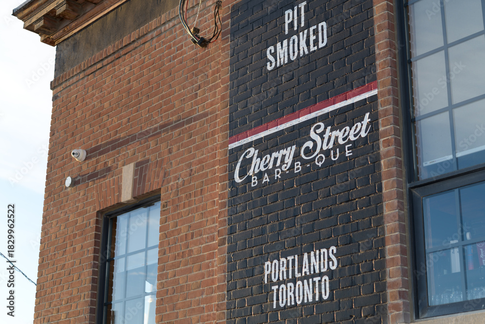 Obraz premium exterior wall sign at Cherry Street Bar-B-Que, a barbecue restaurant, located at 275 Cherry St, Port Lands, Toronto