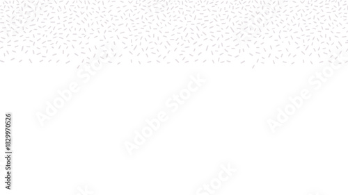 A white background with small gray confetti pieces scattered across the top portion of the image area