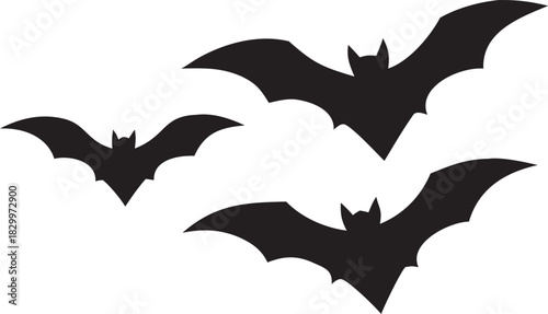Three flying bat silhouettes, perfect for halloween and spooky design.