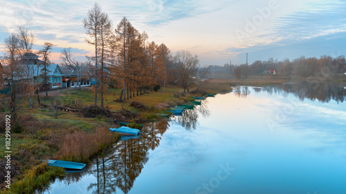 A beautiful view of the Solonitsa River near the village of Pakhomovo. Sunset and fog by the river.