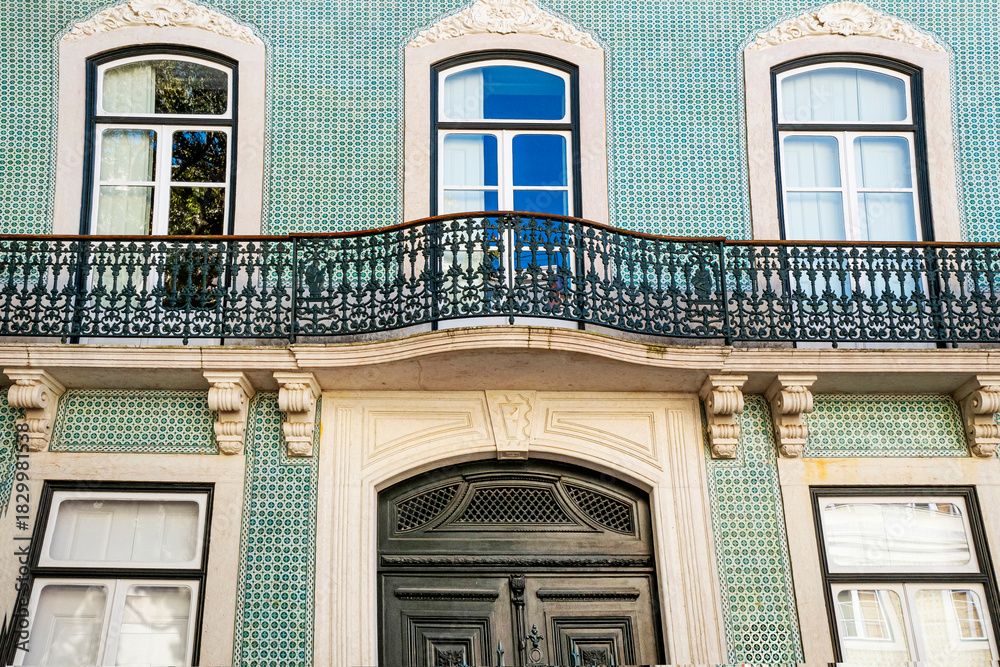Obraz premium Beautiful and luxury building's facade from XIX Century in the Avenida da Liberdade, Freedom Avenue, known as the “Champs-Élysées of Lisbon,” where expansive brands are concentrated, Portugal, 2023