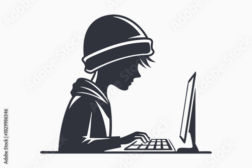 Young person wearing a hat is intently typing on the computer keyboard