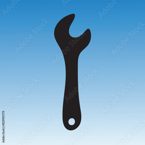 Black wrench silhouette against a blue gradient background, tool for repair