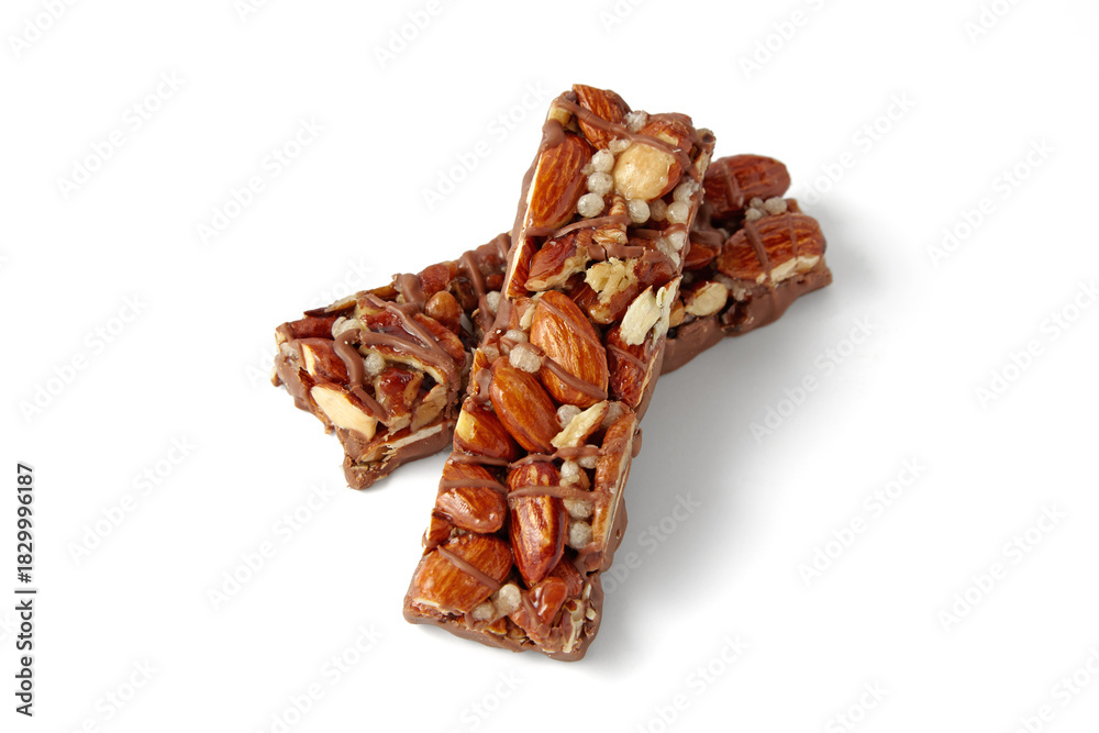 Obraz premium Two sweet caramel nut bars isolated on white background.