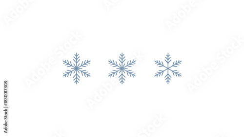 Three delicate blue and silver sparkling snowflakes with intricate crystalline patterns on a clean white background