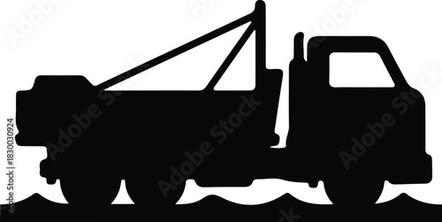 Illustration of tow truck wrecker in silhouette vector