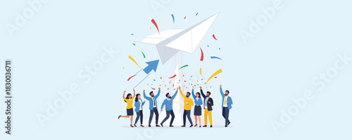 Group of cheerful business people stand together celebrating as a giant paper airplane takes off into sky with colorful confetti falling around them representing launch of new project