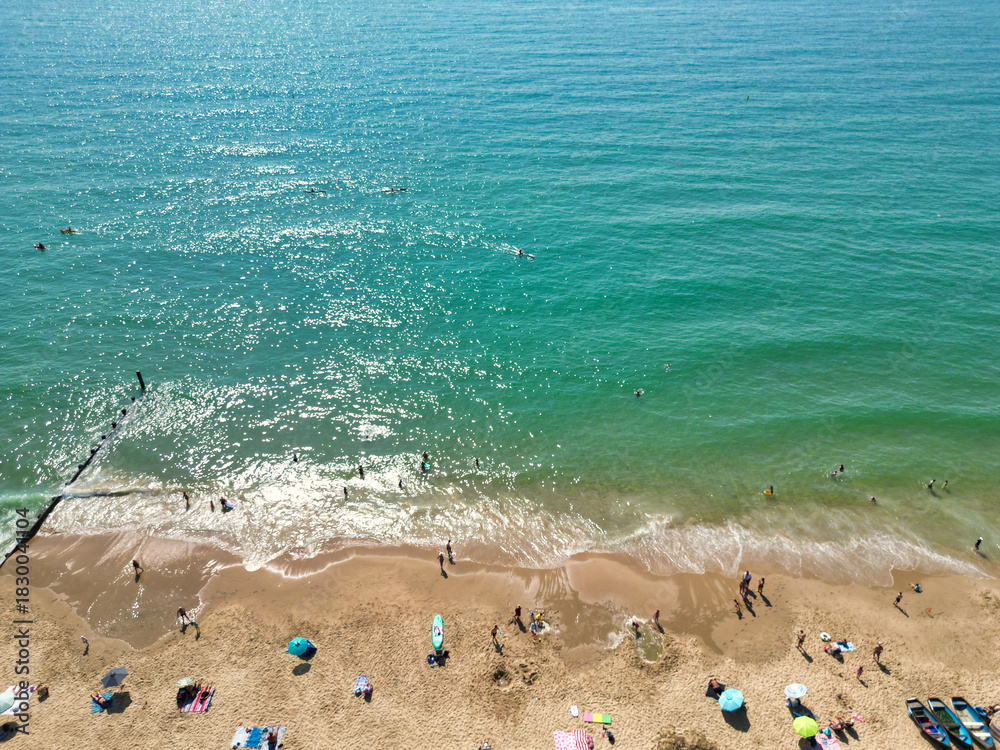 Obraz premium Aerial View of Bournemouth Beach and Ocean City of England. Aerial Footage Was Captured During Hot Sunny Day of 12th, August 2025 With Drone Camera. 