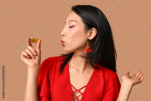 Beautiful young Asian woman...