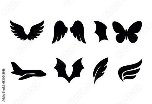 Wings solid icons — angel, bird, bat, butterfly, and demon wings — stock vector.