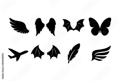 Wings solid icons — angel, bird, bat, butterfly, and demon wings — stock vector.