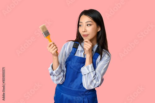Female Asian thoughtful pai...