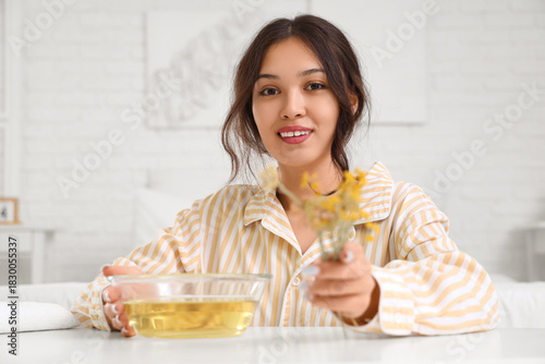 Young Asian woman preparing...