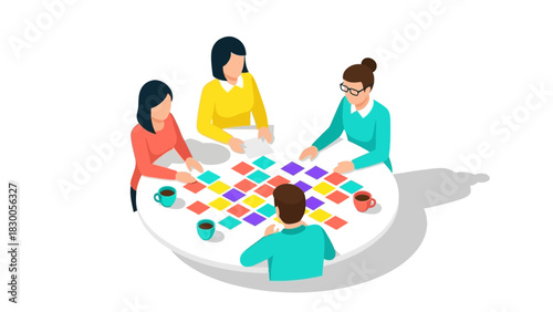 Team collaboration at round table with colorful papers