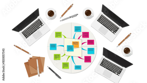 Collaborative office workspace with laptops and mind map diagram for creative planning