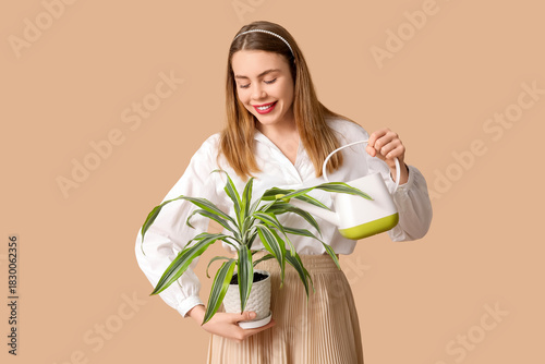 Beautiful young woman water...