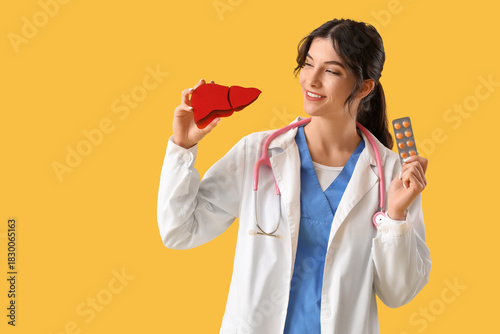 Female doctor with paper li...