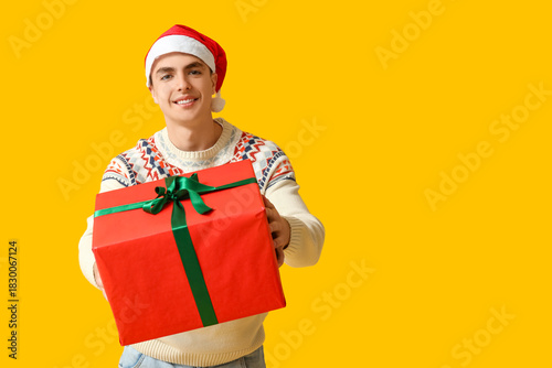 Happy young man in Christma...