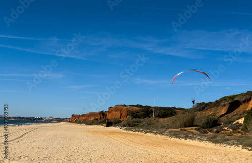 Paraglider on a sunny day at Beach, Portugal