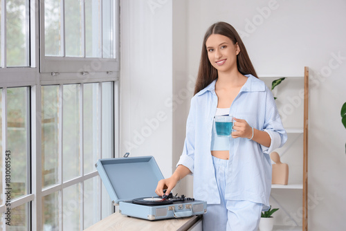 Beautiful young woman with ...