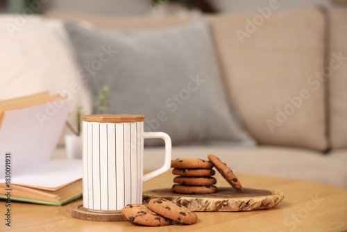 Cup with coasters and cooki...