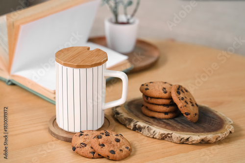 Cup with coasters and cooki...